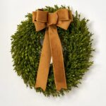 Close-up of blooms and berries on this Lifelike English Boxwood Leaf Christmas 5 Holiday Bow