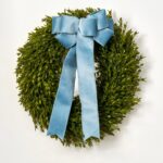 The Lifelike English Boxwood Leaf Christmas 5 Holiday Bow shown in full, highlighting full wreath