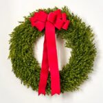 The Realistic English Boxwood Leaf Christmas 5 Holiday Bow shown in full, highlighting full wreath