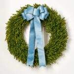 Alternate angle of the Realistic English Boxwood Leaf Christmas 5 Holiday Bow showing wreath face