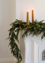 Side view of the SAVE - Real Touch Norfolk Pine Garland revealing tip-to-tip full