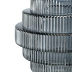 Alternate angle of the Multi - Tiered Geometric Smoke Fluted Glass Vase showing bloom arrangement