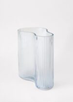 The Clear Glass Ridged Asymmetrical Vase Ridged Asymmetrical Vase shown in full, highlighting vase silhouette