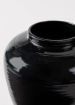 Alternate angle of the Glazed Ribbed Stoneware Table Stoneware Table Vase showing bloom arrangement