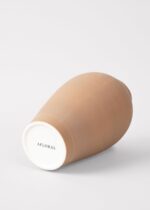 Side view of the Terracotta Medium Ceramic Vase - 14 inch Tall revealing bloom arrangement