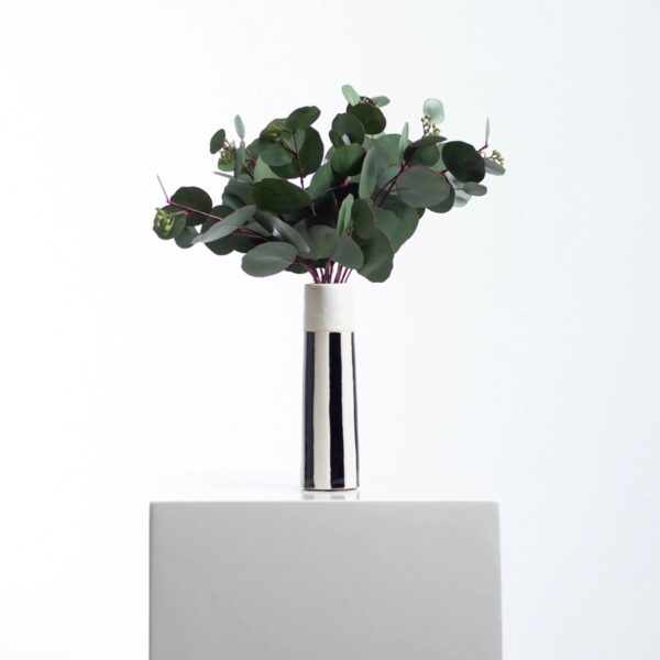 Close-up of vase silhouette detail on this Real Touch Seeded Silver Dollar Ceramic Tori Vase