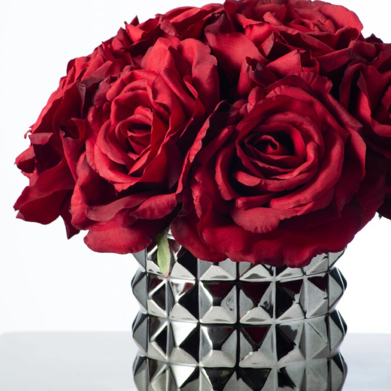 Close-up of vase silhouette detail on this Deep Red Diana Silk Rose Ceramic Gunmetal Vase