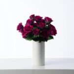 Magenta Mixed Rose and Bud Faux Silk Floral Arrangement in White Cylinder Ceramic Vase
