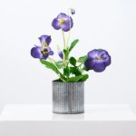 The Lifelike Pansy Faux Floral Arrangement Faux Floral Arrangement shown in full, highlighting full plant