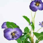 Alternate angle of the Lifelike Pansy Faux Floral Arrangement Faux Floral Arrangement showing frond and