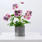 Close-up detail capturing branch layering of the Lifelike Pansy Faux Floral Arrangement Faux Floral Arrangement