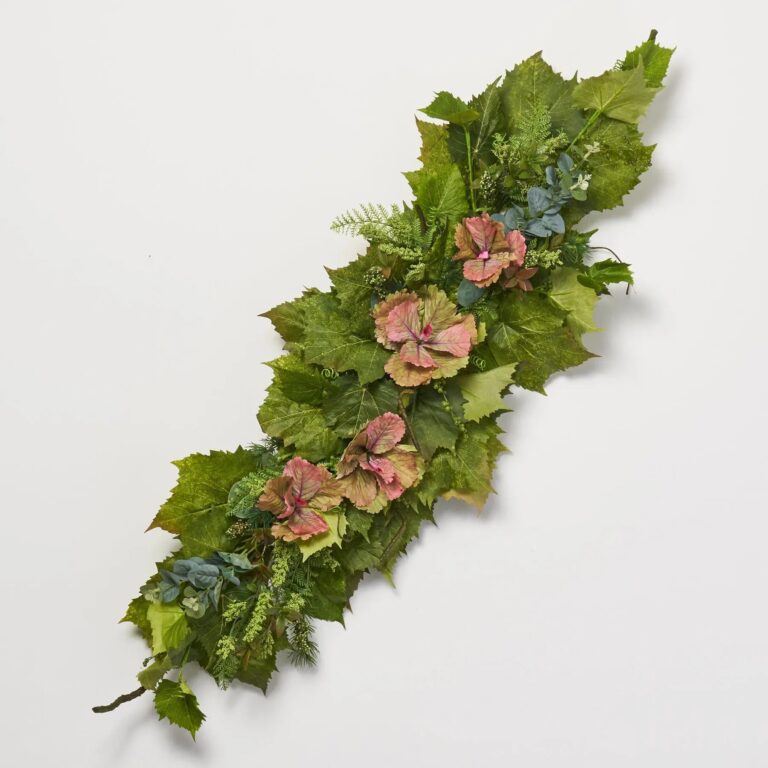 Close-up of swag tail detail on this Garden of Eden - Grapevine Centerpiece Swag Arrangement