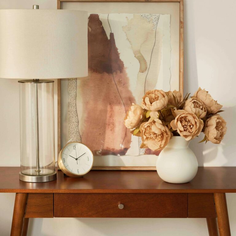 Close-up of vase silhouette detail on this Cafe Au Lait Peonies Floral Centerpiece Arrangement