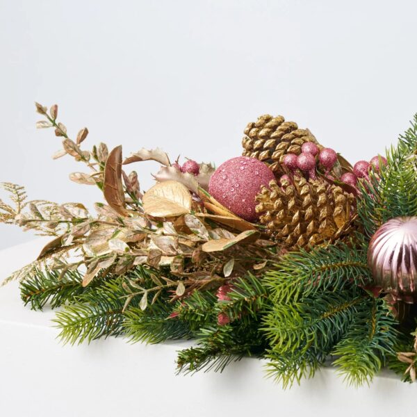 Close-up of swag tail detail on this Mixed Pine and Pink Ornament Holiday Table Swag