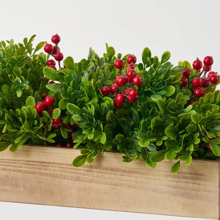 Close-up of leaf foliage texture on this Lifelike Holiday Boxwood with Red Christmas Centerpiece Arrangement
