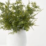 Close-up of leaf foliage texture on this Lifelike Juniper Berry Small Faux Winter Holiday Arrangement