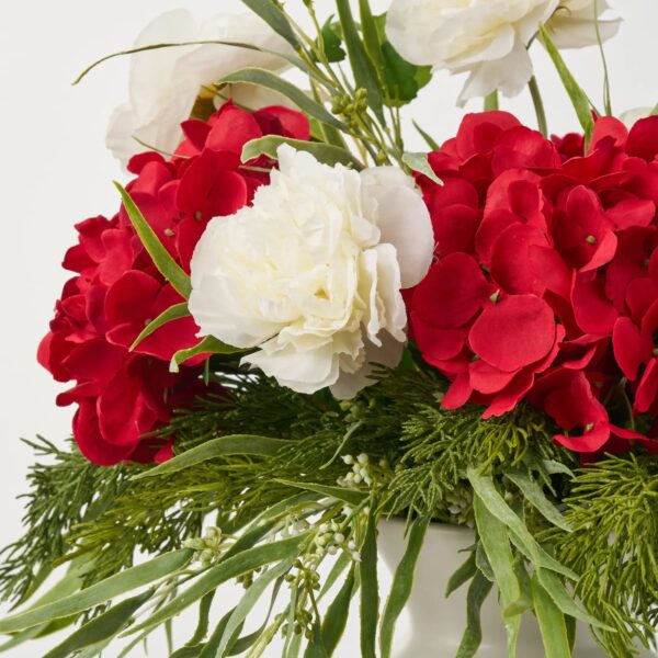Close-up of vase silhouette detail on this Home For The Holidays Christmas Centerpiece Arrangement