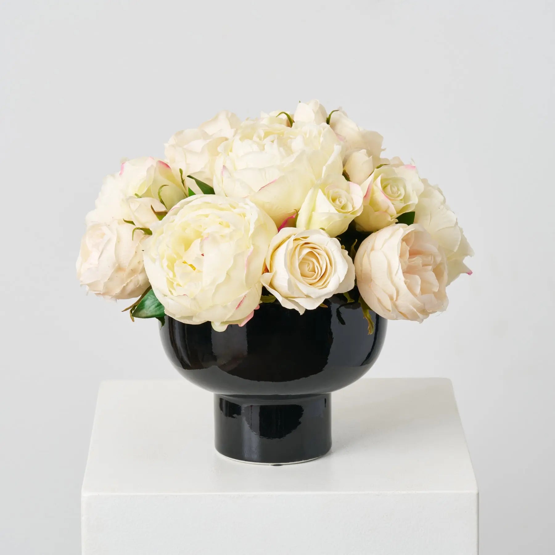 AR1843ModernElegance-RealTouchCreamPeony_BeigeEnglish_JulietteRoseBlooms_BudsinBlackCompoteBow_1.jpg Modern Elegance - Real Touch Cream Peony, Blush English Vase Everyday Arrangement
