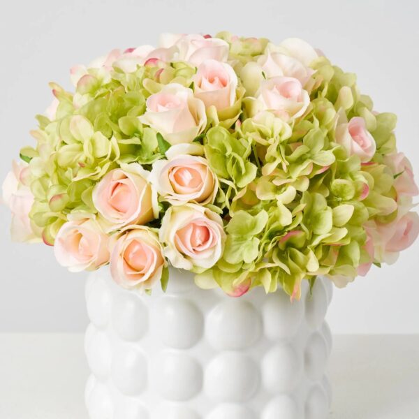 Close-up of vase silhouette detail on this Lifelike Green Hydrangea and Blush Floral Centerpiece Arrangement