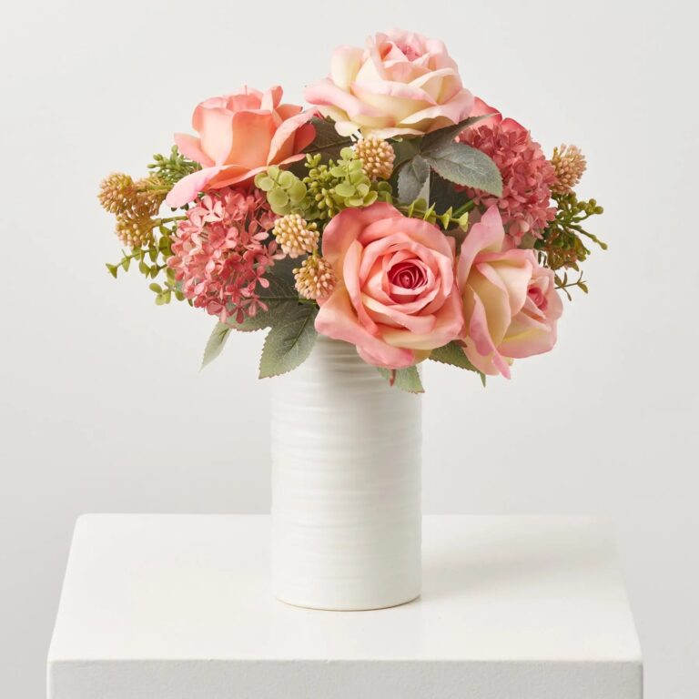 Close-up of vase silhouette detail on this Mixed Pink Rose and Snowball Spring Fall Arrangement