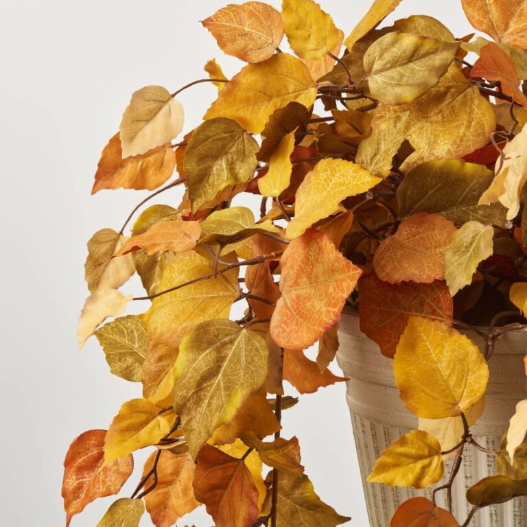 Close-up of bloom cluster detail on this Mixed Gold, Rust and Fall Urn Filler Arrangement
