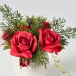 Close-up of vase silhouette detail on this Mini Red Christmas Rose Holiday Decor Arrangement Set