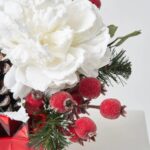 Alternate angle of the Snow Covered Glitter White Peony, Vase Christmas Arrangement showing bloom arrangement