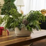 Alternate angle of the Rustic Winter - Real Touch Christmas Centerpiece Arrangement showing bloom arrangement