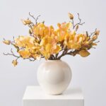 Golden Yellow Magnolia Blooms and Branches in Cream Gloss Ceramic Rounded Vase Everyday Centerpiece Arrangement