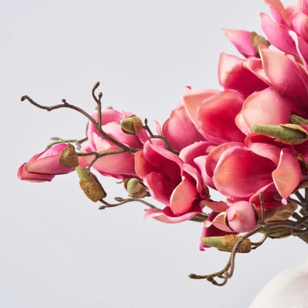 Close-up of vase silhouette detail on this Fuchsia Pink Magnolia Blooms Everyday Centerpiece Arrangement