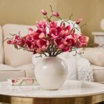 Alternate angle of the Fuchsia Pink Magnolia Blooms Everyday Centerpiece Arrangement showing bloom arrangement in