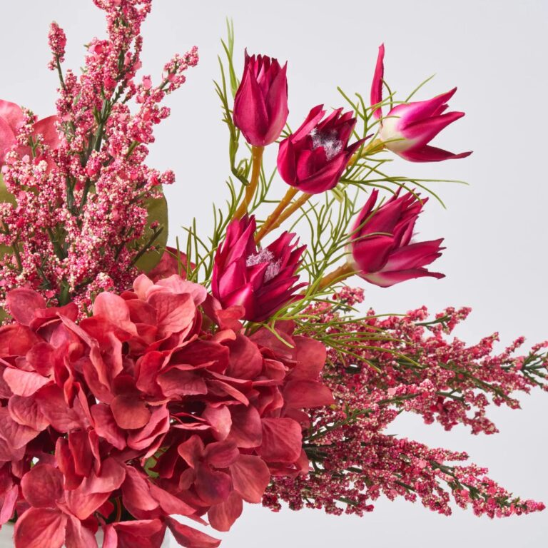 Close-up of vase silhouette detail on this Garden of Love - Rosey Spring Fall Arrangement