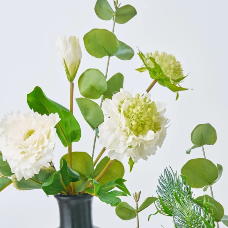 Close-up of vase silhouette detail on this Modern Trio - Real Touch Bottle Vase Arrangement