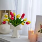 Close-up of vase silhouette detail on this Spring's Gifts - Pink Faux Floral Arrangement