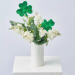 Alternate angle of the Lucky Lilacs - White Blooms, Patrick's Day Arrangement showing bloom arrangement