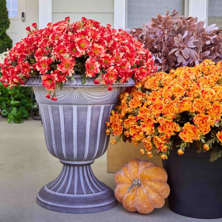 Close-up of bloom cluster detail on this Red Faux Zinnia Mum Bush Fall Arrangement Urn