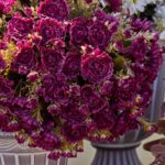 Close-up of bloom cluster detail on this Purple Faux Classic Mum Bush Fall Arrangement Urn