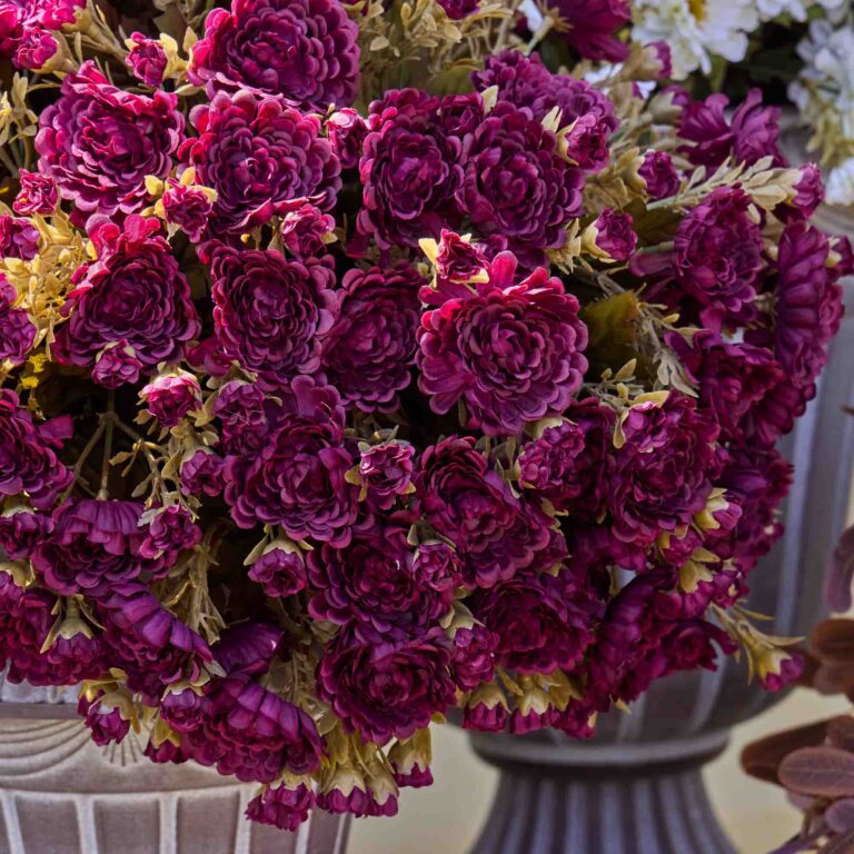 Close-up of bloom cluster detail on this Purple Faux Classic Mum Bush Fall Arrangement Urn