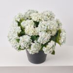 The Soft Blue Faux Hydrangea Bush Summer Arrangement Urn shown in full, highlighting bloom cluster