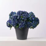 Alternate angle of the Deep Blue Faux Hydrangea Bush Fall Arrangement Urn showing full arrangement