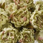 Detail view of stem and foliage layering from the Faux Pistachio Green Peony Bush Spring