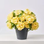 Alternate angle of the Faux Yellow Peony Bush Outdoor Spring Summer Arrangement showing full arrangement