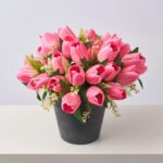 Alternate angle of the Faux Pink Tulip Outdoor Urn Spring Summer Arrangement showing full arrangement