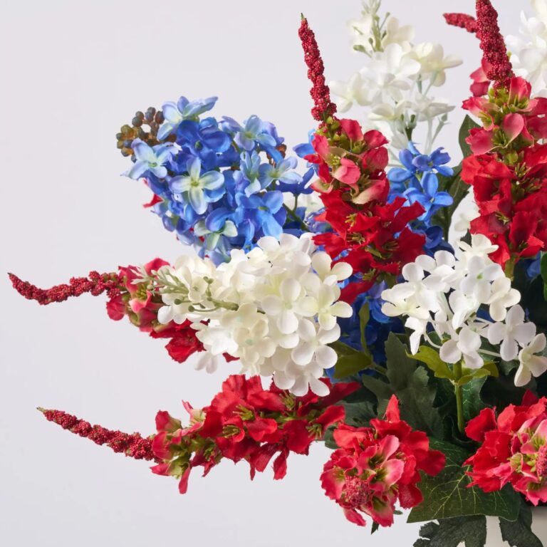 Close-up of vase silhouette detail on this Flower Fireworks - Red Delphinium, Matte Cream Vase