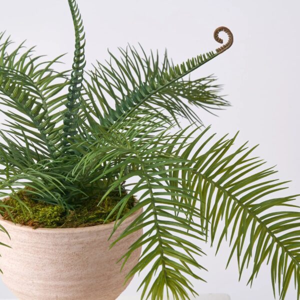 Close-up of vase silhouette detail on this Wild Faux Cycas Fern Greenery Spring Arrangement