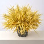 Side view of the Faux Triticum Wheat Bush Outdoor Potted Bush Arrangement revealing full arrangement