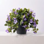 Alternate angle of the Blooming Purple Petunia Cascade Faux Urn Filler Arrangement showing full plant