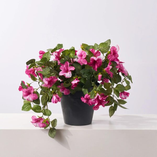 Close-up of leaf foliage texture on this Blooming Magenta Petunia Cascade Faux Urn Filler Arrangement