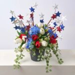 Alternate angle of the Red, White and Bloom Urn Filler Arrangement showing full arrangement shape