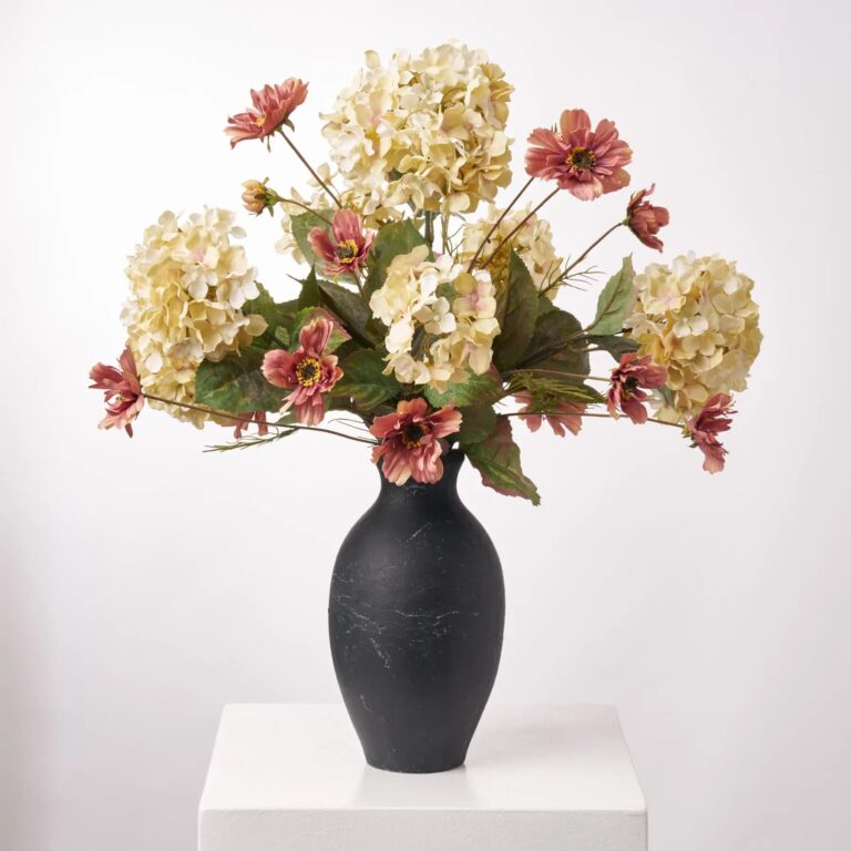 Close-up of vase silhouette detail on this Rustic Elegance - Cream Vintage Black Terracotta Vase